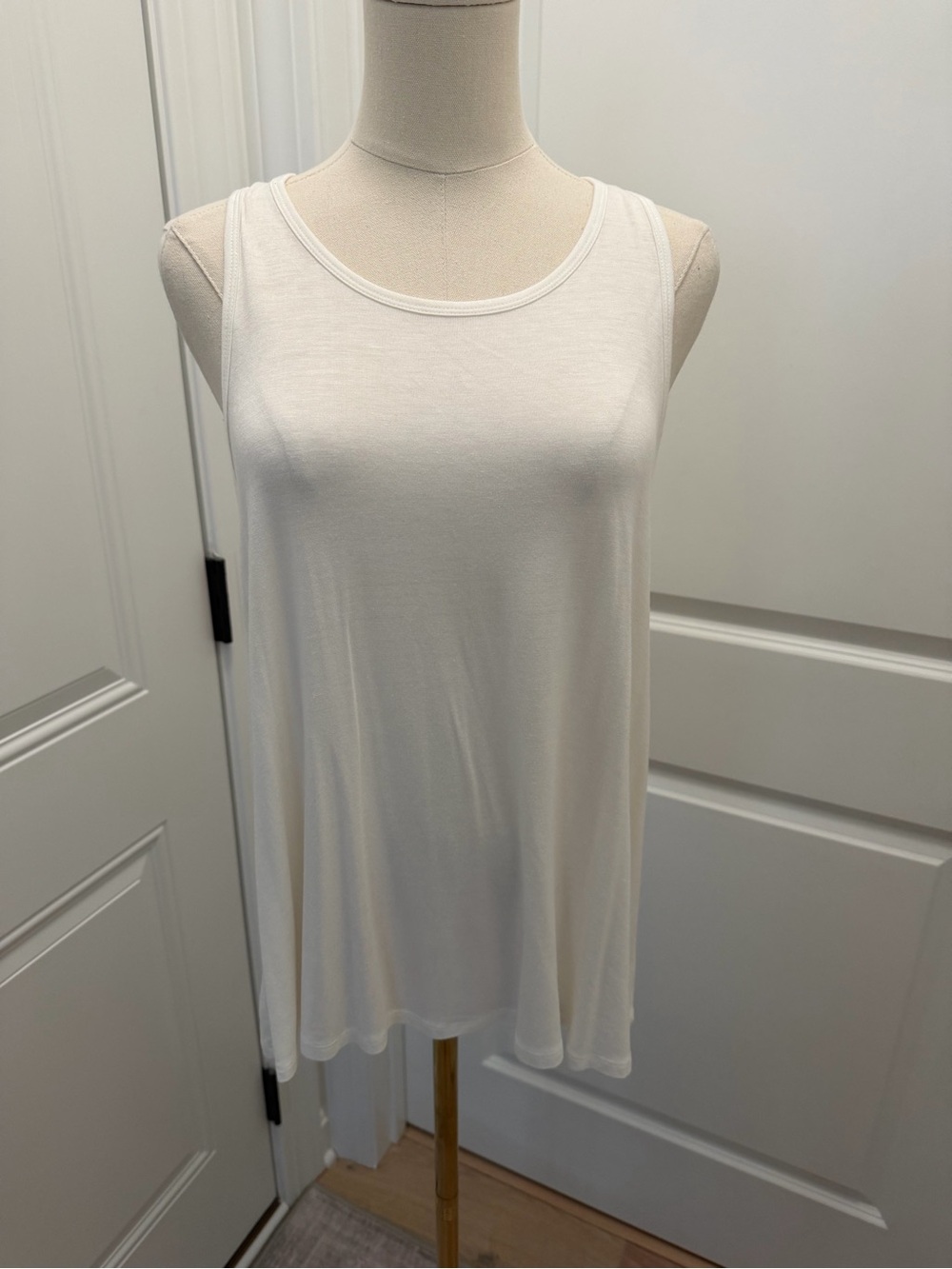 Impressions Cream Scoop Neck Sleeveless Tank with open lower back.